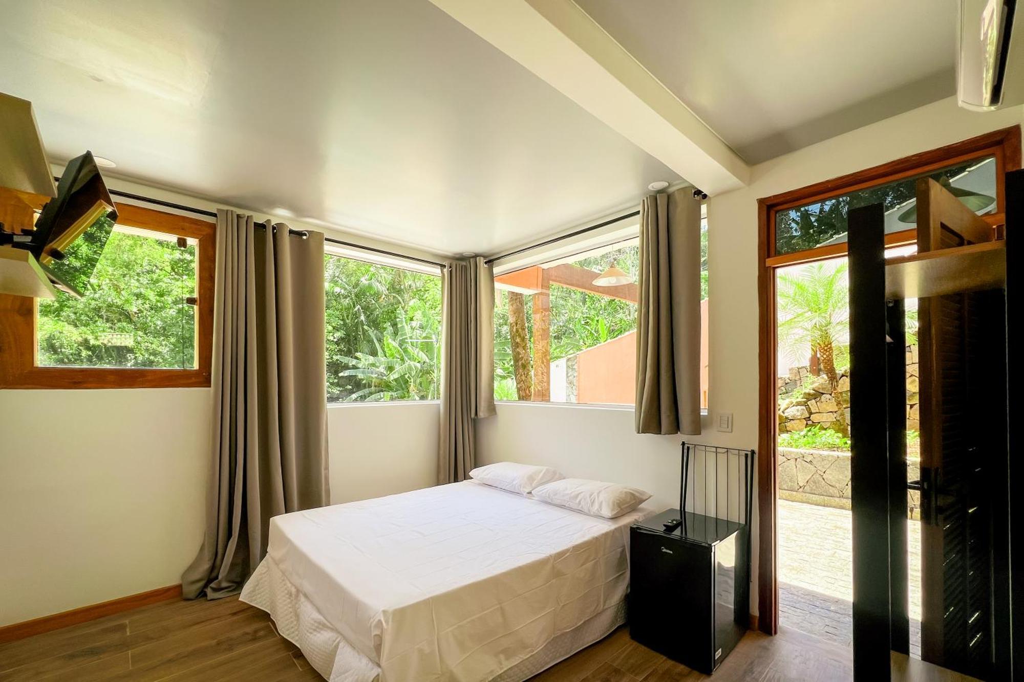Quarto Queen com Vista para o Jardim